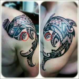 lizard-symbol-embedded-in-a-hammerhead-shark-tattoo